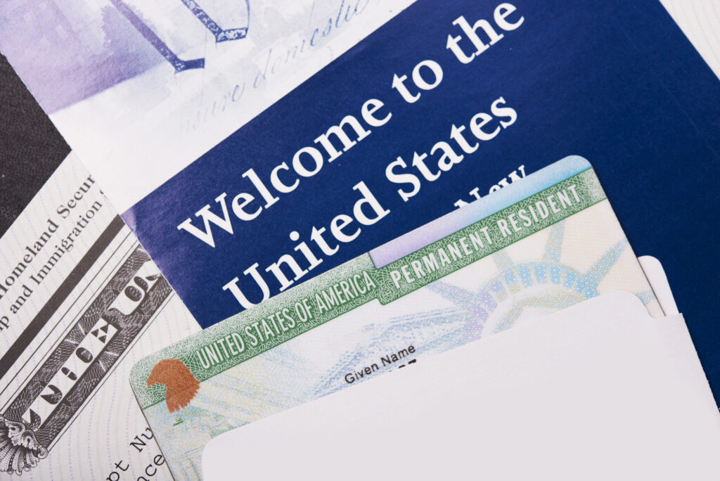 Green card with "Welcome to the United States"